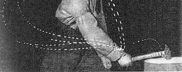 Bernstein's motion study of a blacksmith: dotted traces showing the arc of the arm and hammer across repeated strikes, each path slightly different